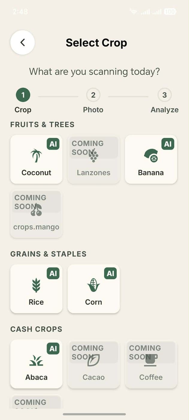 Crop selection screen showing coconut, banana, rice, corn and abaca available to scan, with other crops marked coming soon