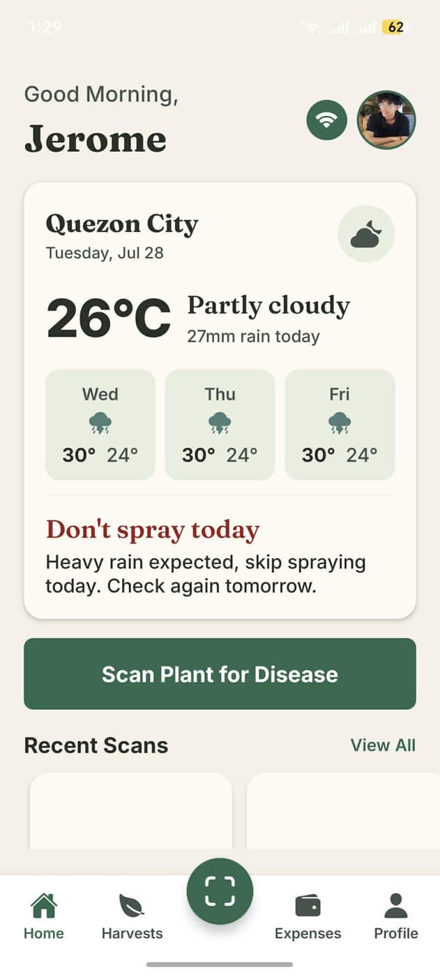 FutureSeed AI home screen showing local weather, a warning not to spray because heavy rain is expected, and a Scan Plant for Disease button